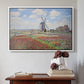 White floater framed canvas featuring Tulip Fields with the Rijnsburg Windmill, 1886 by Claude Monet above an entryway table in a minimalist foyer.