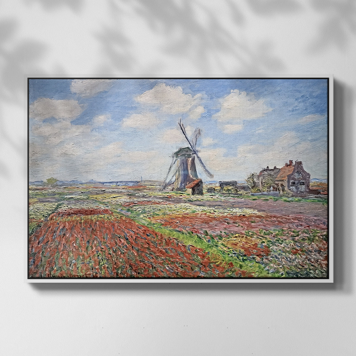 Front view of Tulip Fields with the Rijnsburg Windmill, 1886 by Claude Monet in a white floater framed canvas.