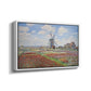 Angled view of Tulip Fields with the Rijnsburg Windmill, 1886 by Claude Monet in a white floater framed canvas.