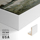 Close-up of the white floater frame corner and gallery wrapped canvas construction.
