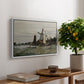 Windmill at Zaandam, 1871 by Claude Monet, presented in a white floater framed canvas featuring a single windmill beside water with surrounding buildings and sky, displayed above a hallway console table.