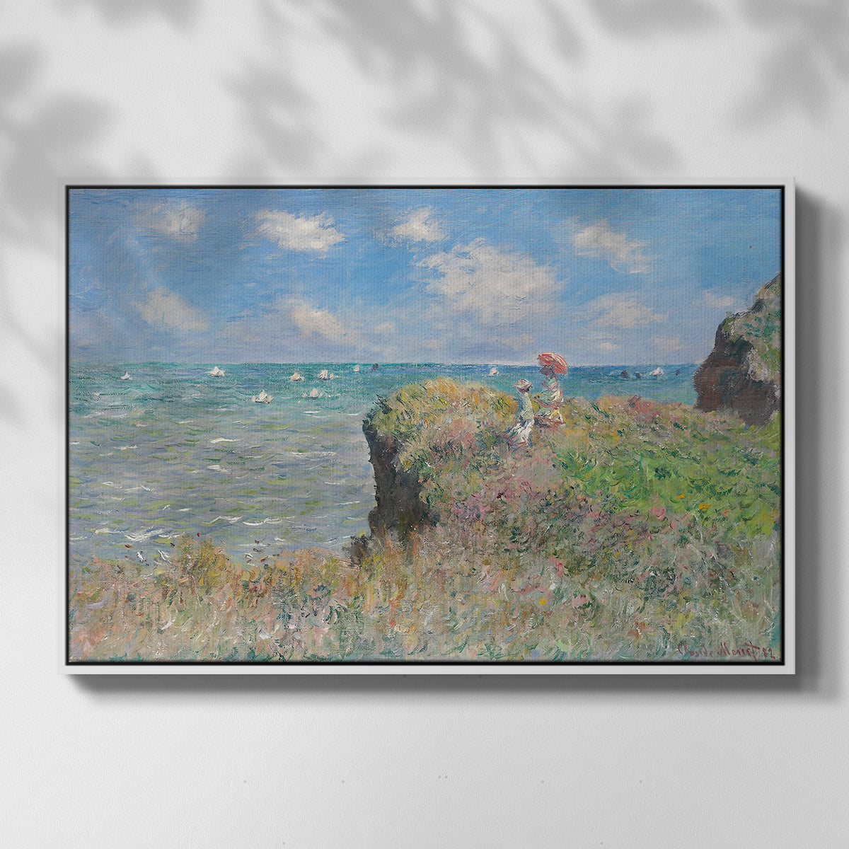 Front view of The Cliff Walk at Pourville, 1882 by Claude Monet in a white floater framed canvas.