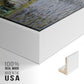 Close-up of the white floater frame corner and gallery wrapped canvas construction.