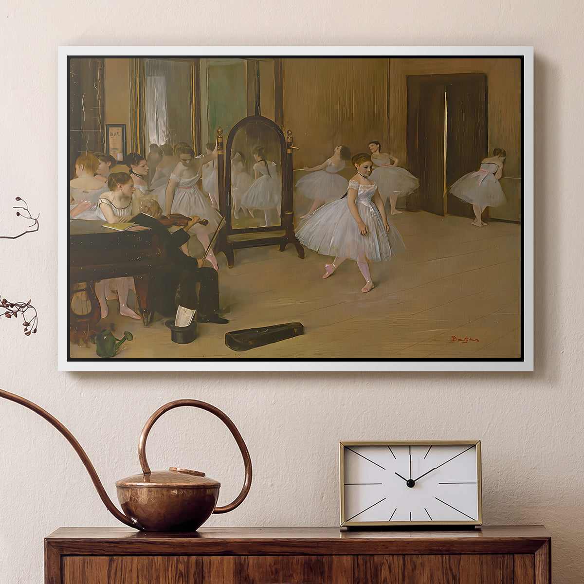 White floater framed canvas featuring an impressionist interior capturing movement and discipline of dancers, displayed above a cabinet in a soft-toned living room.