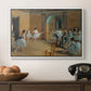 The Dance Foyer at the Opera on the Rue Le Peletier, 1872 by Edgar Degas in a white floater framed canvas displayed above a console table in a hallway, featuring an elegant rehearsal space with dancers in soft lighting.