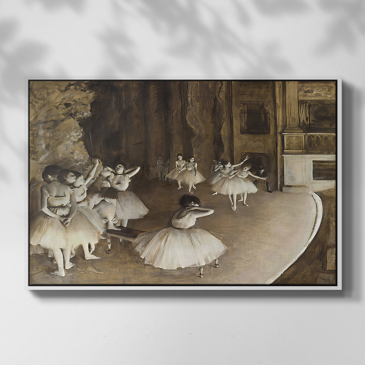 Front view of The Rehearsal of the Ballet Onstage, 1874 by Edgar Degas in a white floater framed canvas.