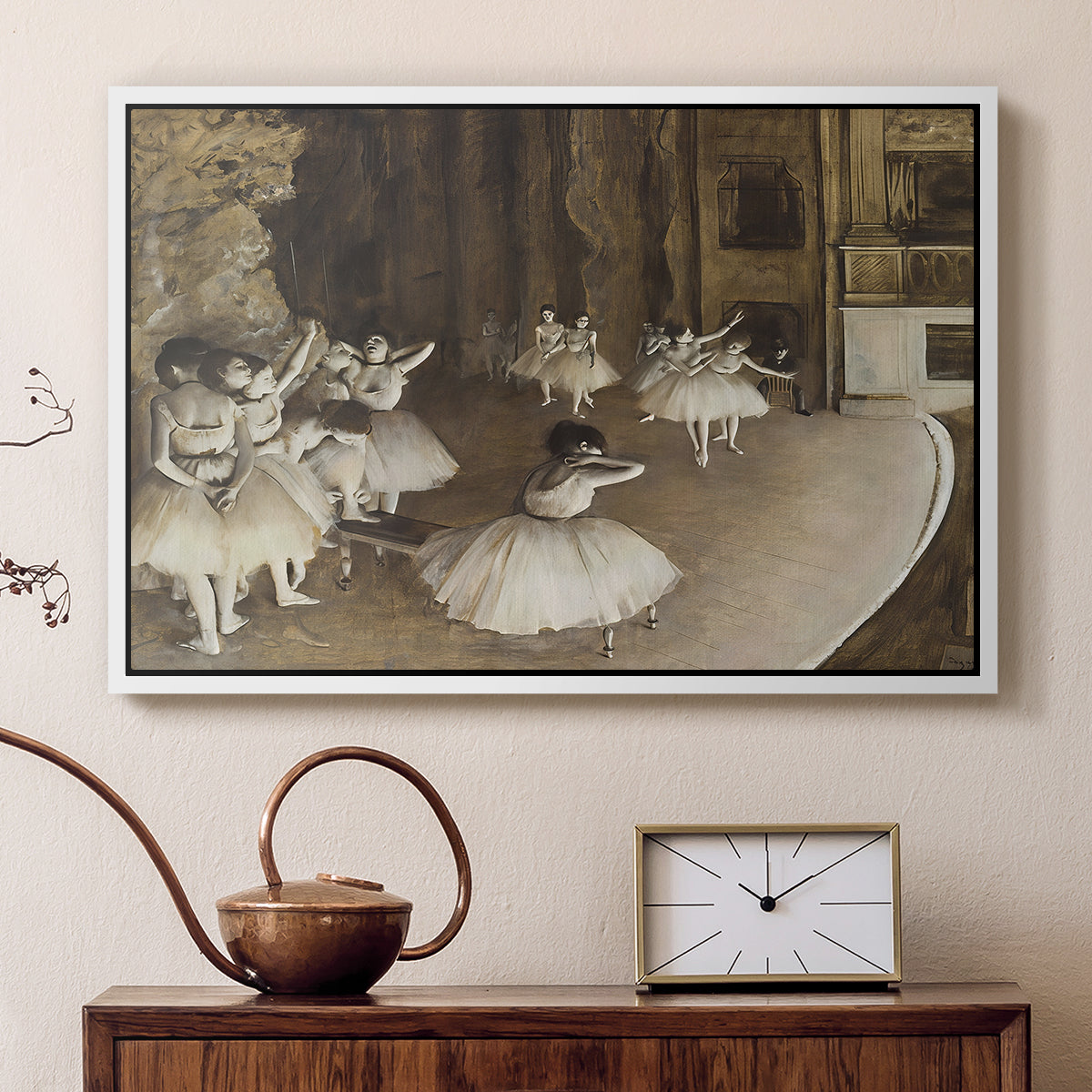 White floater framed canvas featuring an impressionist depiction of ballet practice on theater stage, displayed above a cabinet in a soft-toned living room.