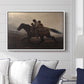 A Ride for Liberty – The Fugitive Slaves, c. 1862 by Eastman Johnson displayed above a sofa in a living room in a white floater frame, featuring a dramatic scene of enslaved people fleeing on horseback in darkness.