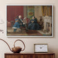 White floater framed canvas featuring an Americana scene with figures sitting and interacting indoors, displayed above a cabinet in a soft-toned living room.