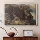 White floater framed canvas featuring a high-altitude scene with rocky formations and sparse vegetation, displayed above a cabinet in a soft-toned living room.