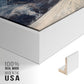 Close-up of the white floater frame corner and gallery wrapped canvas construction.