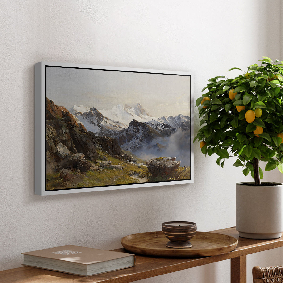 The Großglockner from the Prager Hut, 1890 by Edward Theodore Compton, presented in a white floater framed canvas featuring a view of Großglockner peak from alpine hut overlooking valley, displayed above a hallway console table.
