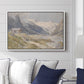 Shepherds (Pasterze), c. 1921 by Edward Theodore Compton displayed above a sofa in a living room in a white floater frame, featuring a pastoral mountain scene with figures tending livestock.
