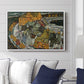 Crescent of Houses II (Island Town), 1915 by Egon Schiele displayed above a sofa in a living room in a white floater frame, featuring a stylized townscape with clustered buildings and bold outlines.