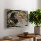 Death and the Maiden, 1915 by Egon Schiele, presented in a white floater framed canvas featuring intertwined figures representing death and woman in emotional embrace, displayed above a hallway console table.