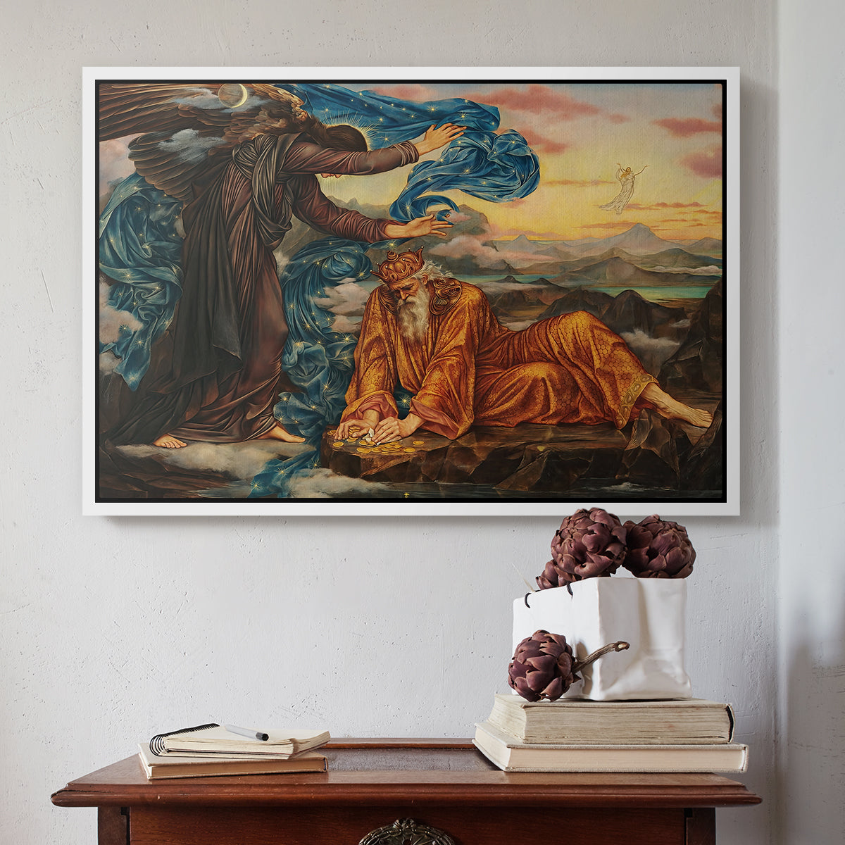 White floater framed canvas featuring Earthbound, 1897 by Evelyn De Morgan above an entryway table in a minimalist foyer.