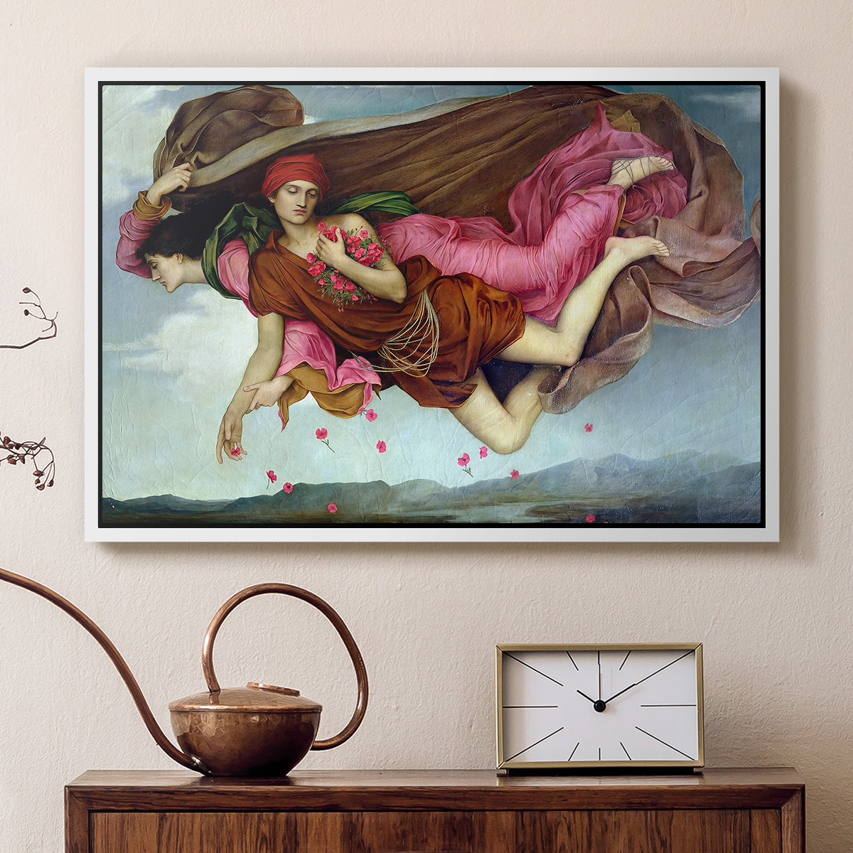 White floater framed canvas featuring a dreamlike scene with draped figures drifting across dark background, displayed above a cabinet in a soft-toned living room.