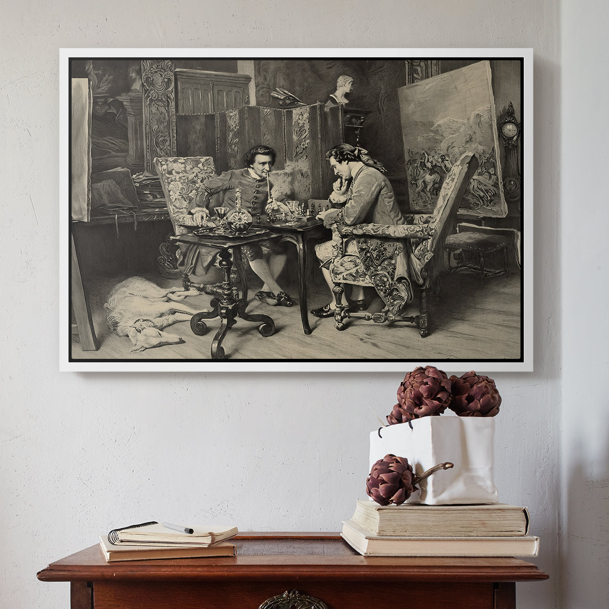 White floater framed canvas featuring The Chess Players, 1858 by Ernest Meissonier above an entryway table in a minimalist foyer.