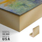 Close-up of the gold floater frame corner and gallery wrapped canvas construction.