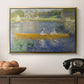 The Skiff (La Yole), 1875 by Pierre-Auguste Renoir in a gold floater framed canvas displayed above a console table in a hallway, featuring a leisure scene of figures in a small rowboat on tranquil water.