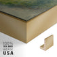 Close-up of the gold floater frame corner and gallery wrapped canvas construction.
