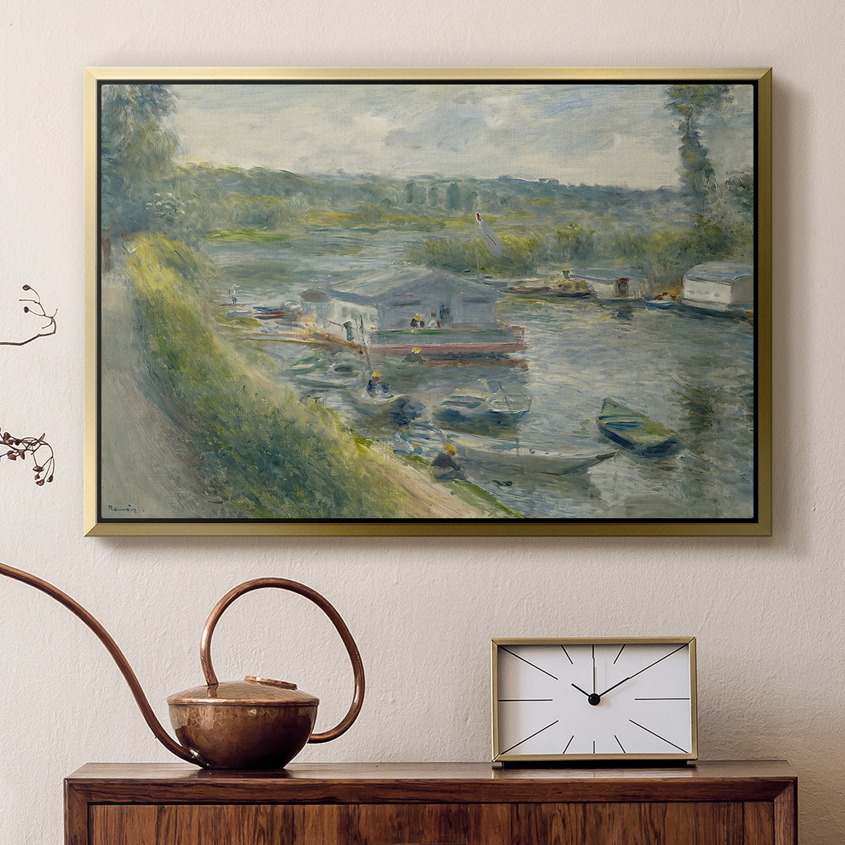 Gold floater framed canvas featuring an impressionist depiction of working boat along calm waterway, displayed above a cabinet in a soft-toned living room.