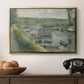Wash-House Boat at Bas-Meudon, c. 1874 by Pierre-Auguste Renoir in a gold floater framed canvas displayed above a console table in a hallway, featuring an everyday life scene with boat and figures along river edge.