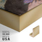 Close-up of the gold floater frame corner and gallery wrapped canvas construction.