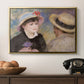Boating Couple (Aline Charigot and Renoir), c. 1881 by Pierre-Auguste Renoir in a gold floater framed canvas displayed above a console table in a hallway, featuring a romantic scene of two figures in casual conversation with soft light.