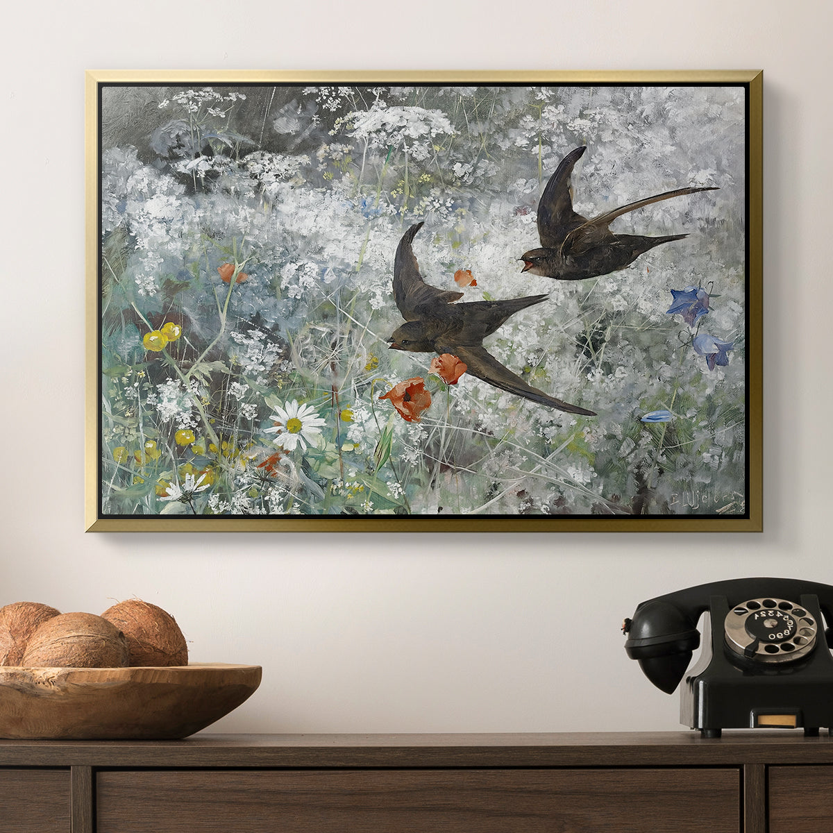 Common Swifts, 1886 by Bruno Liljefors in a gold floater framed canvas displayed above a console table in a hallway, featuring an impressionist wildlife scene capturing birds in motion.