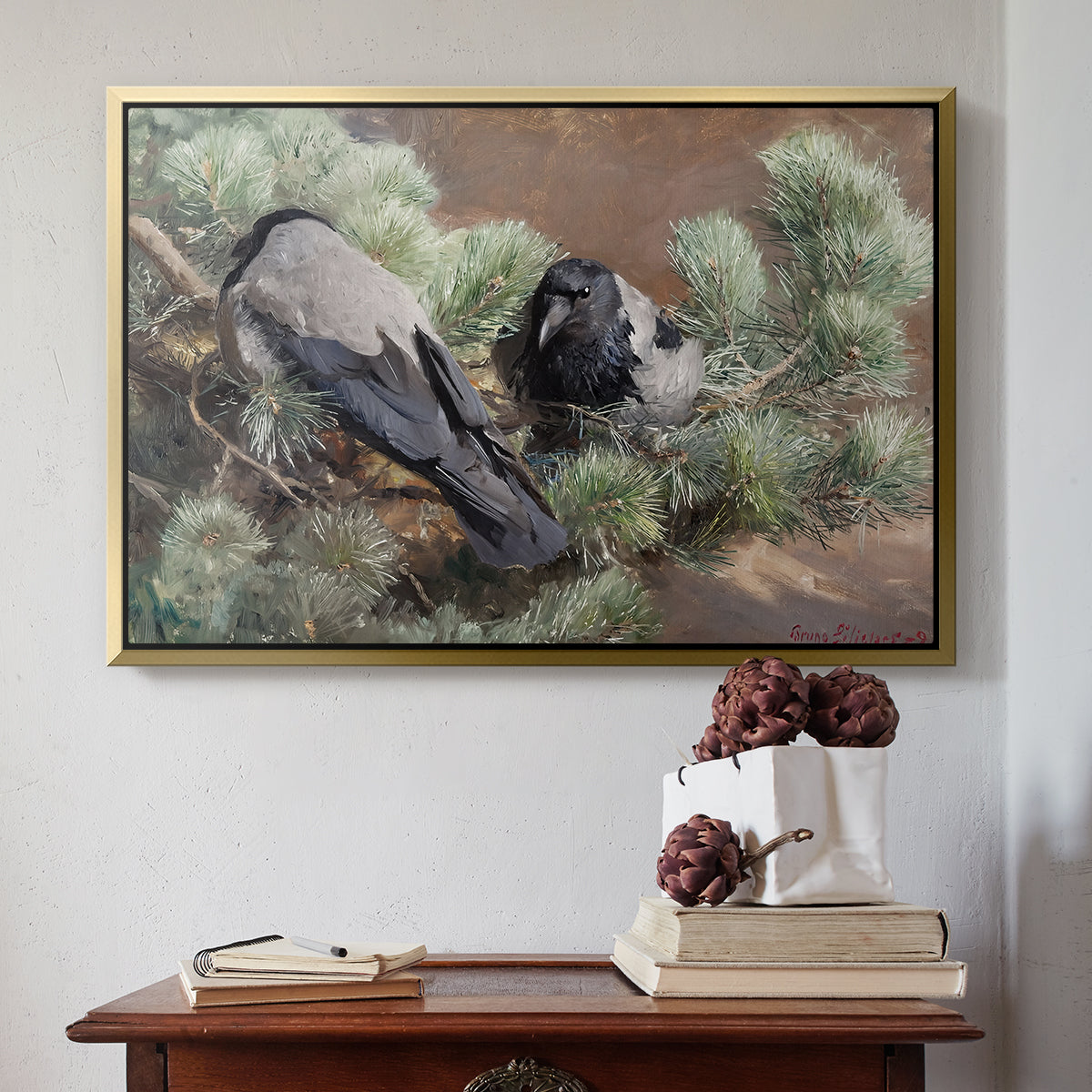 Gold floater framed canvas featuring Hooded Crows (Kråkor), 1891 by Bruno Liljefors above an entryway table in a minimalist foyer.