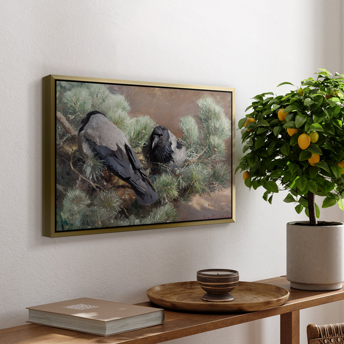 Hooded Crows (Kråkor), 1891 by Bruno Liljefors, presented in a gold floater framed canvas featuring two crows perched on ground among grass and earth tones, displayed above a hallway console table.