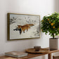 Fox in Snow Landscape, 1900 by Bruno Liljefors, presented in a gold floater framed canvas featuring a fox running across snowy landscape with sparse vegetation, displayed above a hallway console table.
