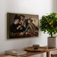 The Cardsharps, c. 1594 by Caravaggio, presented in a gold floater framed canvas featuring two men cheating at cards while a third figure secretly observes behind them, displayed above a hallway console table.
