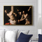 The Flagellation of Christ at the Column (Rouen Version), 1606 by Caravaggio displayed above a sofa in a living room in a gold floater frame, featuring a dramatic religious scene of Christ enduring flagellation in dark interior.
