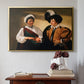 Gold floater framed canvas featuring The Fortune Teller (Louvre Version), c. 1595 by Caravaggio above an entryway table in a minimalist foyer.