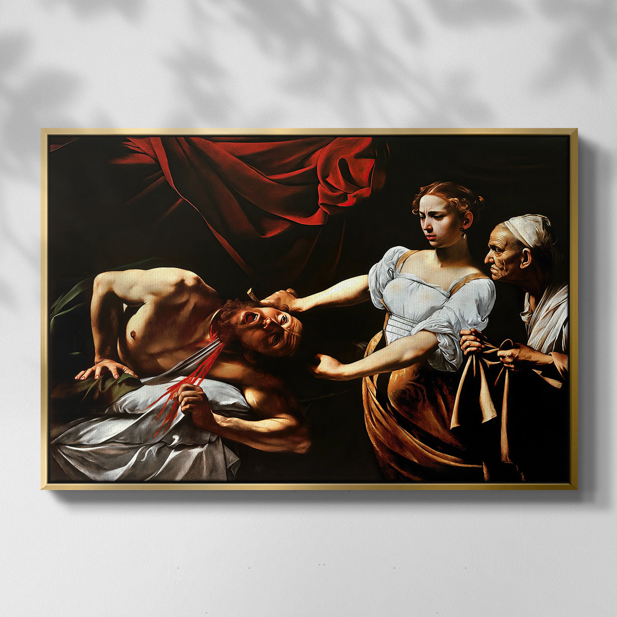 Front view of Judith Beheading Holofernes, c. 1599 by Caravaggio in a gold floater framed canvas.