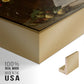 Close-up of the gold floater frame corner and gallery wrapped canvas construction.