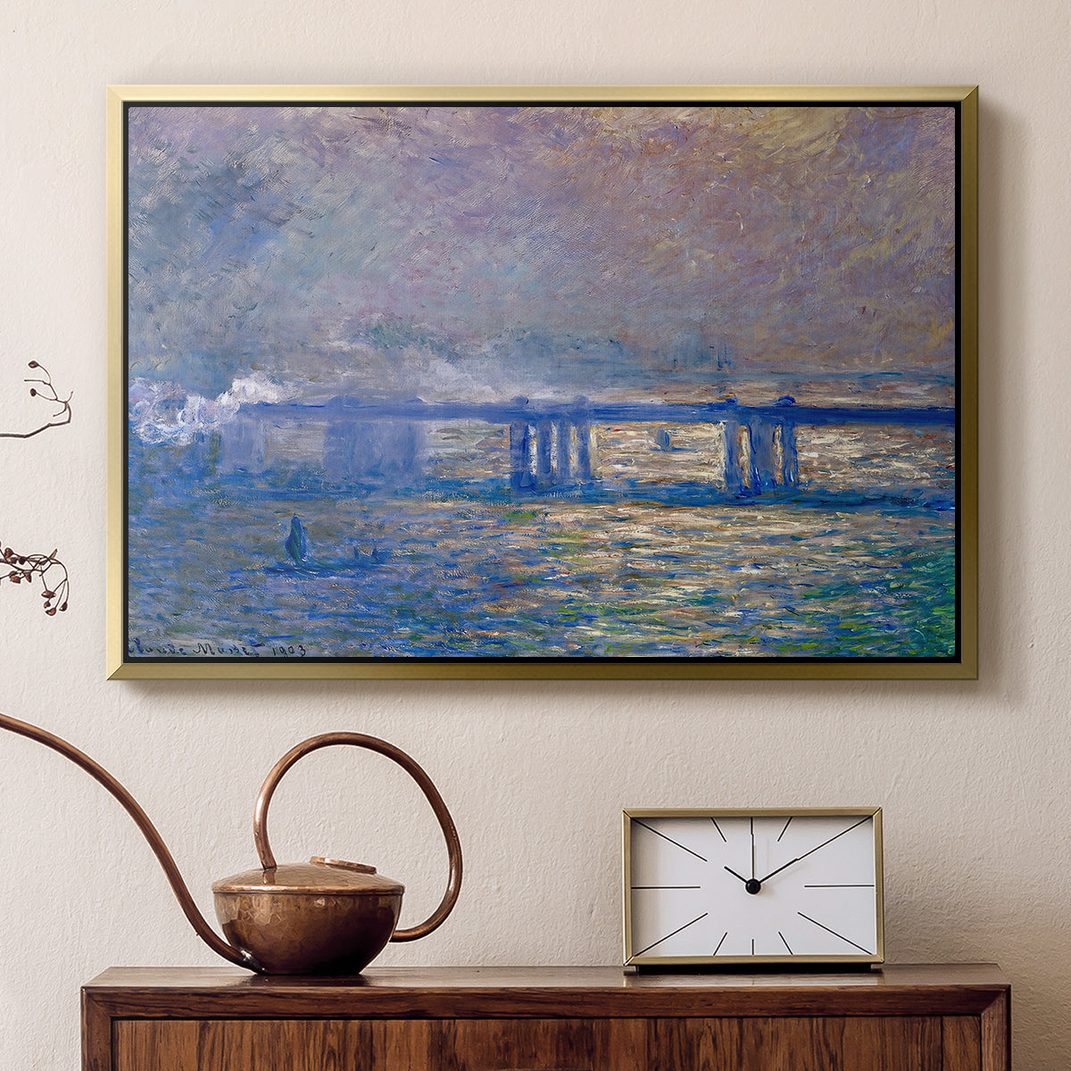 Gold floater framed canvas featuring an atmospheric depiction of London bridge with reflections in water, displayed above a cabinet in a soft-toned living room.