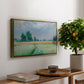 The Wheat Field (Champ de Blé), 1881 by Claude Monet, presented in a gold floater framed canvas featuring a golden wheat field stretching across landscape under soft sky, displayed above a hallway console table.