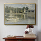 Gold floater framed canvas featuring The Bridge at Argenteuil, 1874 by Claude Monet above an entryway table in a minimalist foyer.