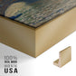 Close-up of the gold floater frame corner and gallery wrapped canvas construction.
