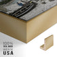 Close-up of the gold floater frame corner and gallery wrapped canvas construction.