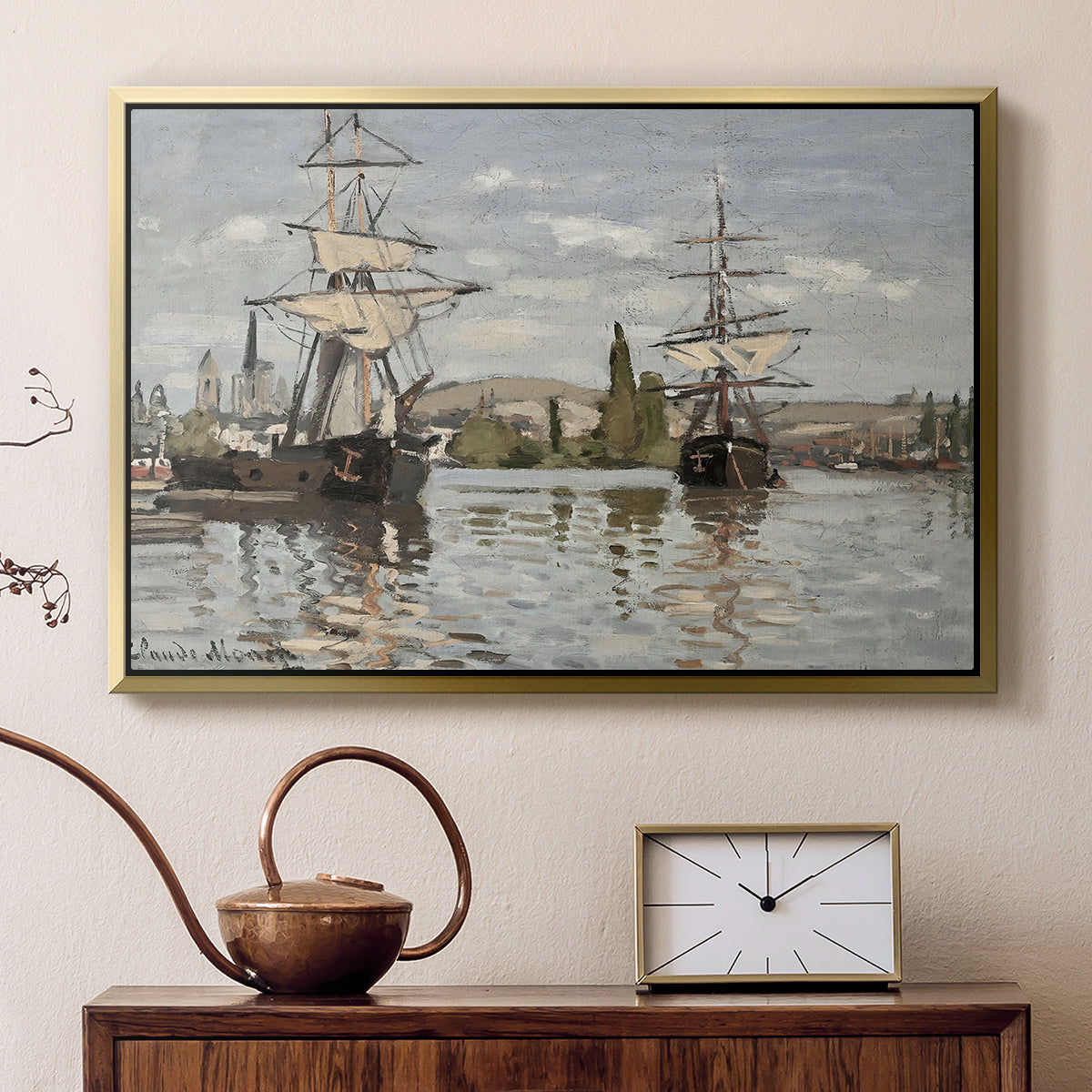Gold floater framed canvas featuring a harbor view with tall ships lining the waterfront in muted tones, displayed above a cabinet in a soft-toned living room.