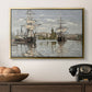 Ships Riding on the Seine at Rouen, 1872 by Claude Monet in a gold floater framed canvas displayed above a console table in a hallway, featuring a nautical landscape with vessels resting on calm water.