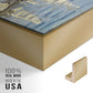 Close-up of the gold floater frame corner and gallery wrapped canvas construction.