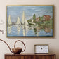Gold floater framed canvas featuring an impressionist depiction of sailing competition on water, displayed above a cabinet in a soft-toned living room.