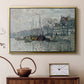 Gold floater framed canvas featuring an urban waterway with docked boats and European buildings, displayed above a cabinet in a soft-toned living room.
