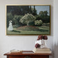 Gold floater framed canvas featuring Woman in the Garden, Sainte-Adresse, 1867 by Claude Monet above an entryway table in a minimalist foyer.