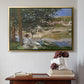 Gold floater framed canvas featuring On the Bank of the Seine, Bennecourt, 1868 by Claude Monet above an entryway table in a minimalist foyer.